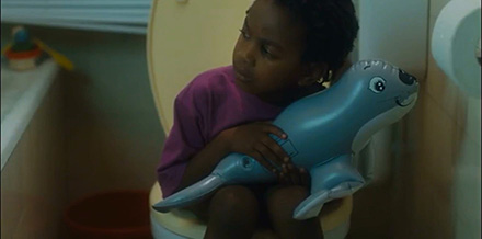 Little ebony girl urinates