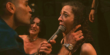 Hostage woman forced to suck microphone