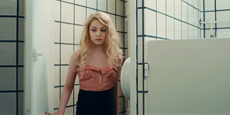 Anamaria Vartolomei sitting on toilet